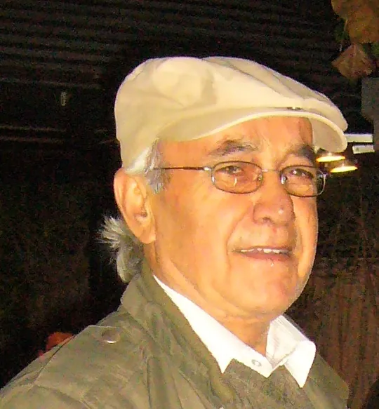 Wahib Bteddini — portrait in a flat cap