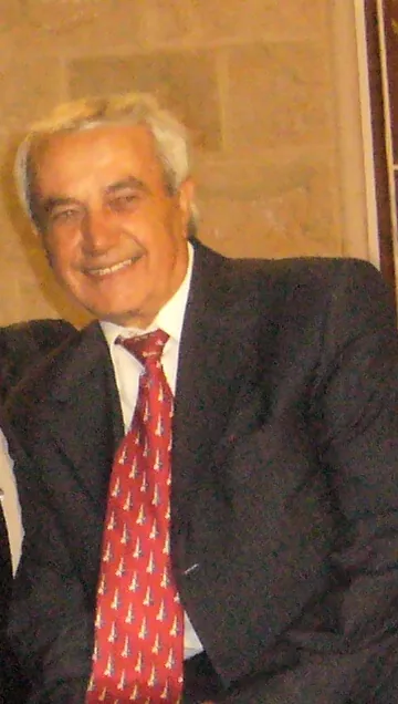Wahib Bteddini — portrait in a dark suit