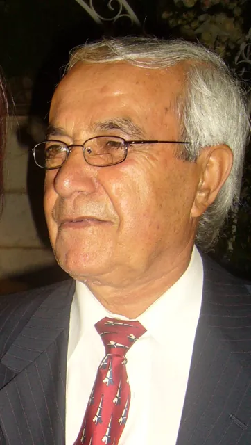 Wahib Bteddini — profile with glasses and a tie