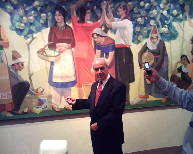 Wahib Bteddini — standing before a painting