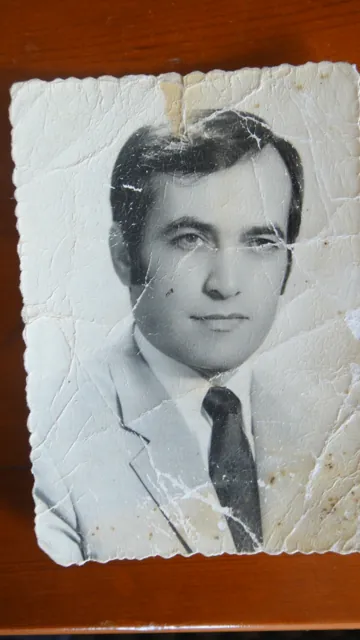 Damaged archival portrait — original archival photograph